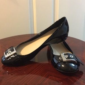 Black shiny flats